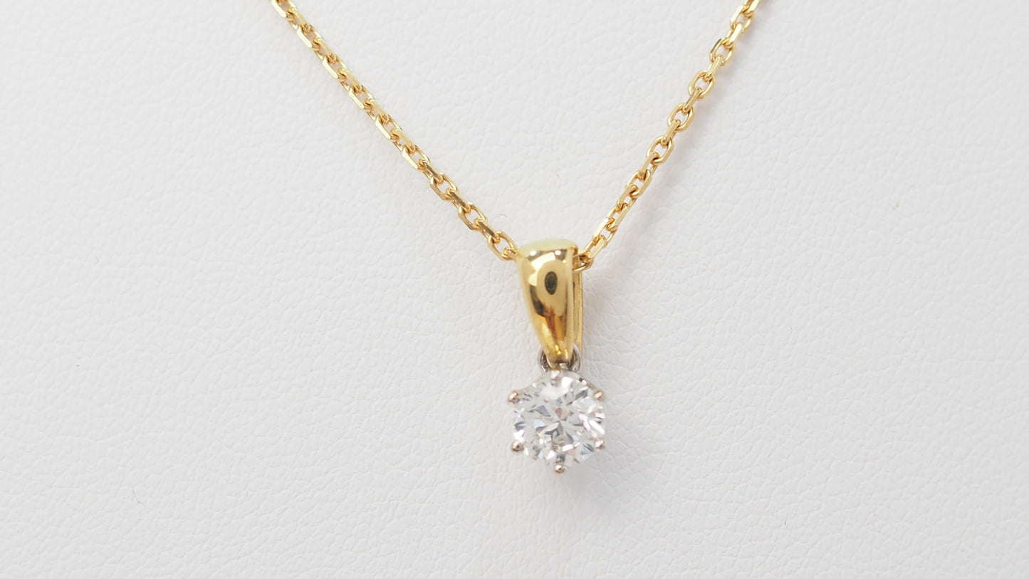 Collier solitaire en or bicolore et diamant