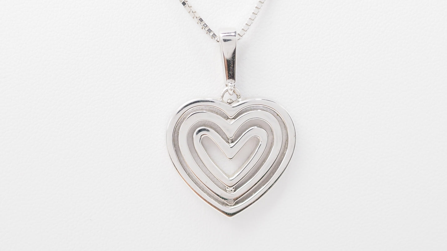 Collier pendentif multi Coeurs en or blanc et diamants