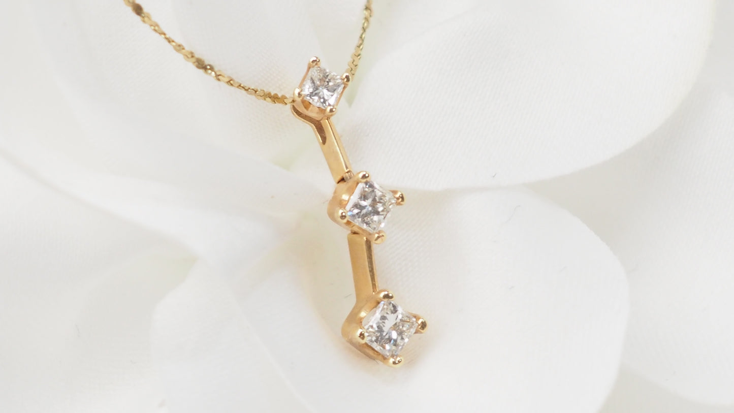 Collier trilogie en or jaune et diamants princesse