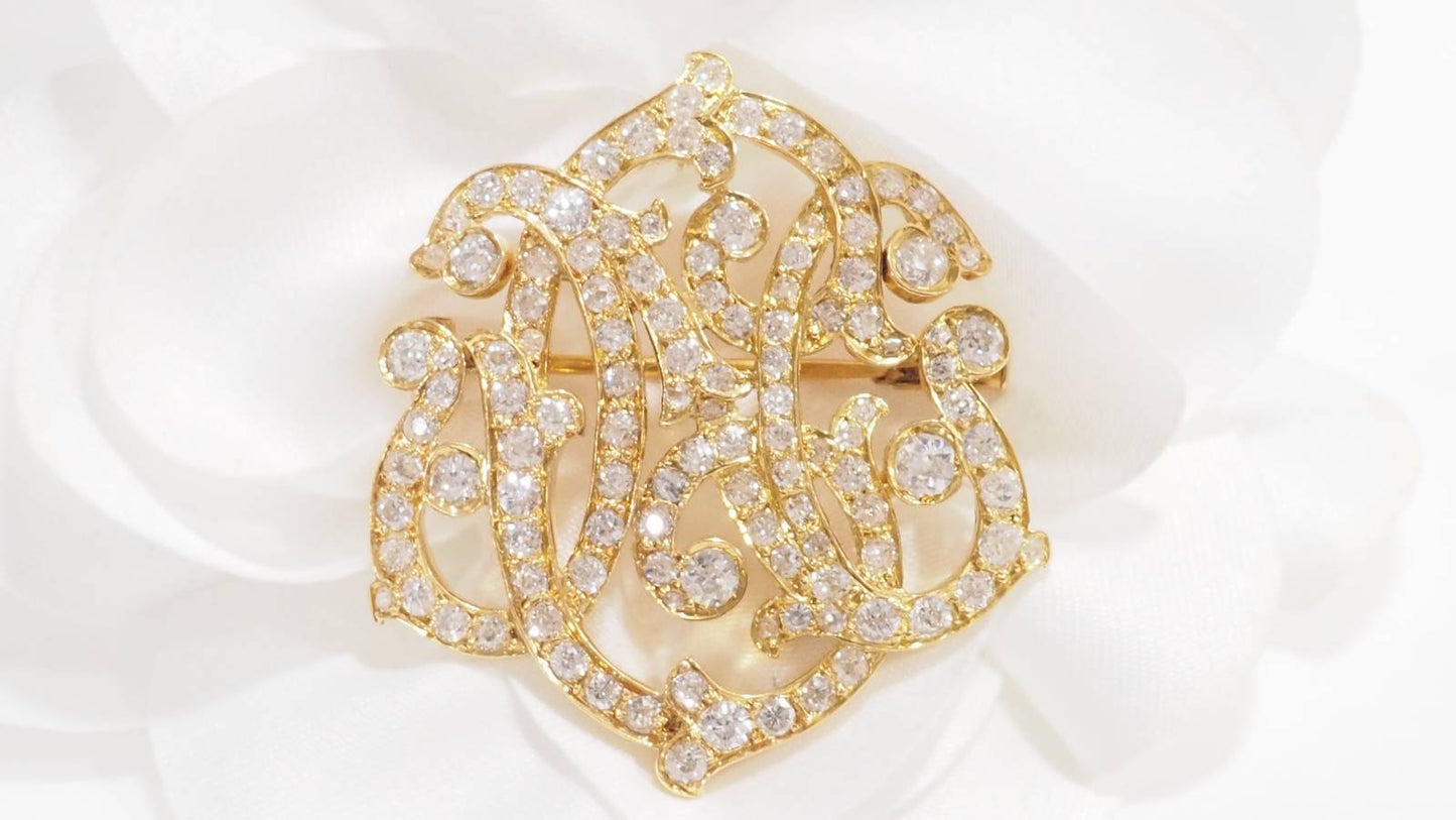 Broche volutes Art Nouveau en or jaune et diamants