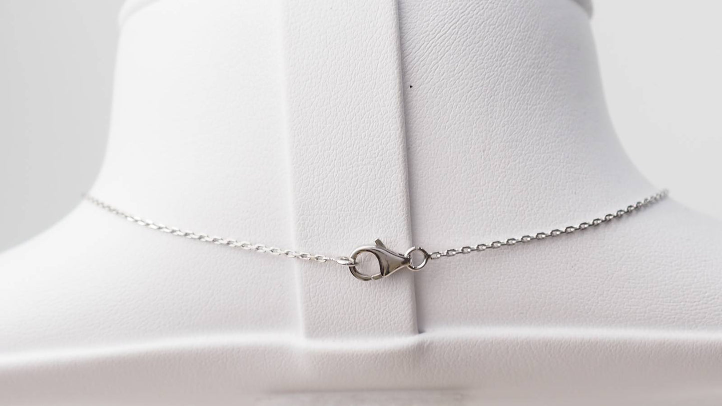 Collier pendentif cercle en or blanc et diamants