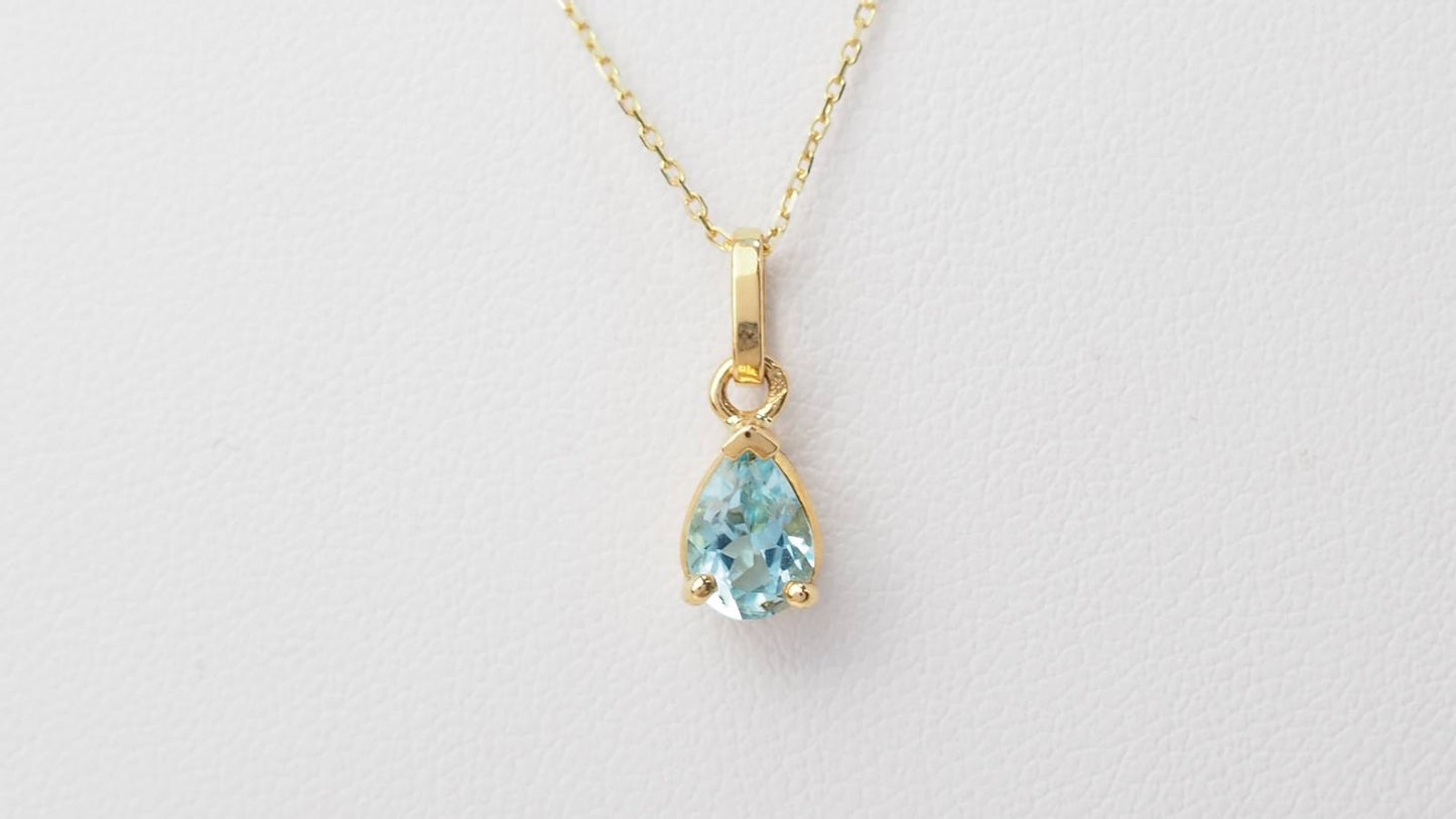 Collier solitaire en topaze bleue