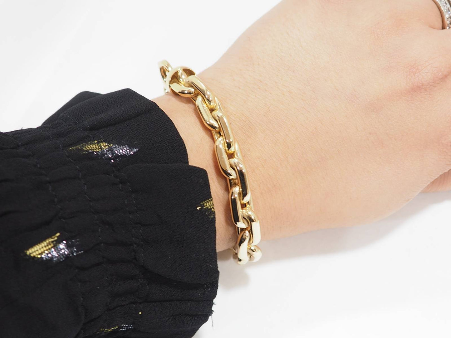 Bracelet en maille forçat limée en or jaune et diamant