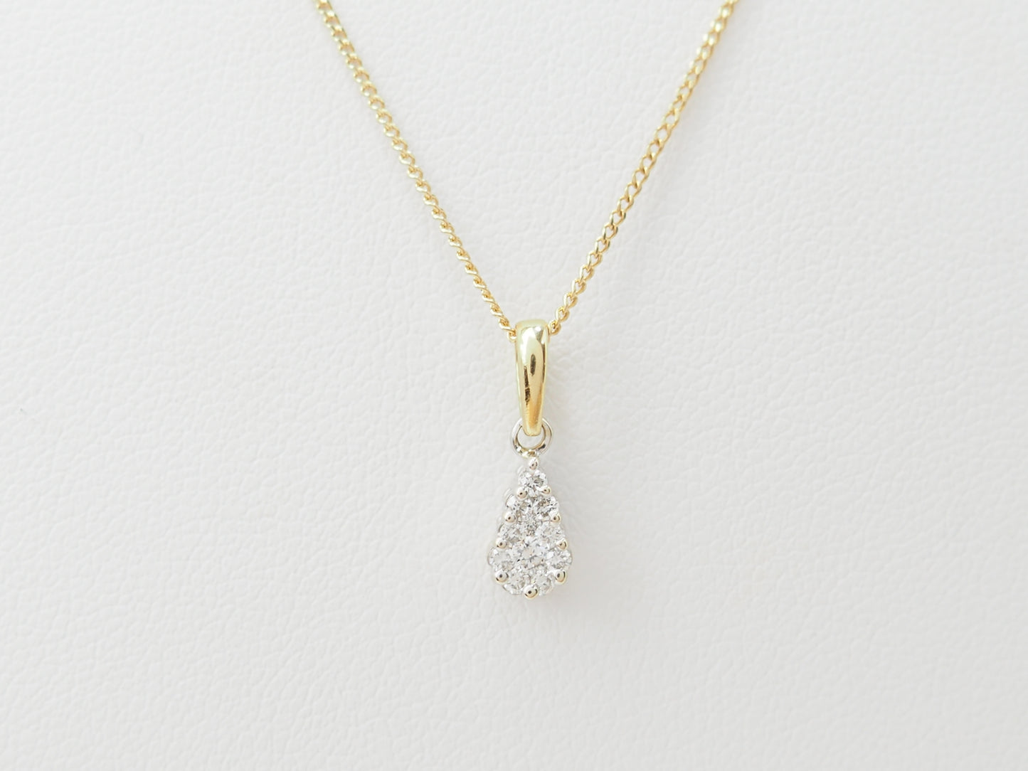 Collier pendentif goutte en or bicolore et diamants