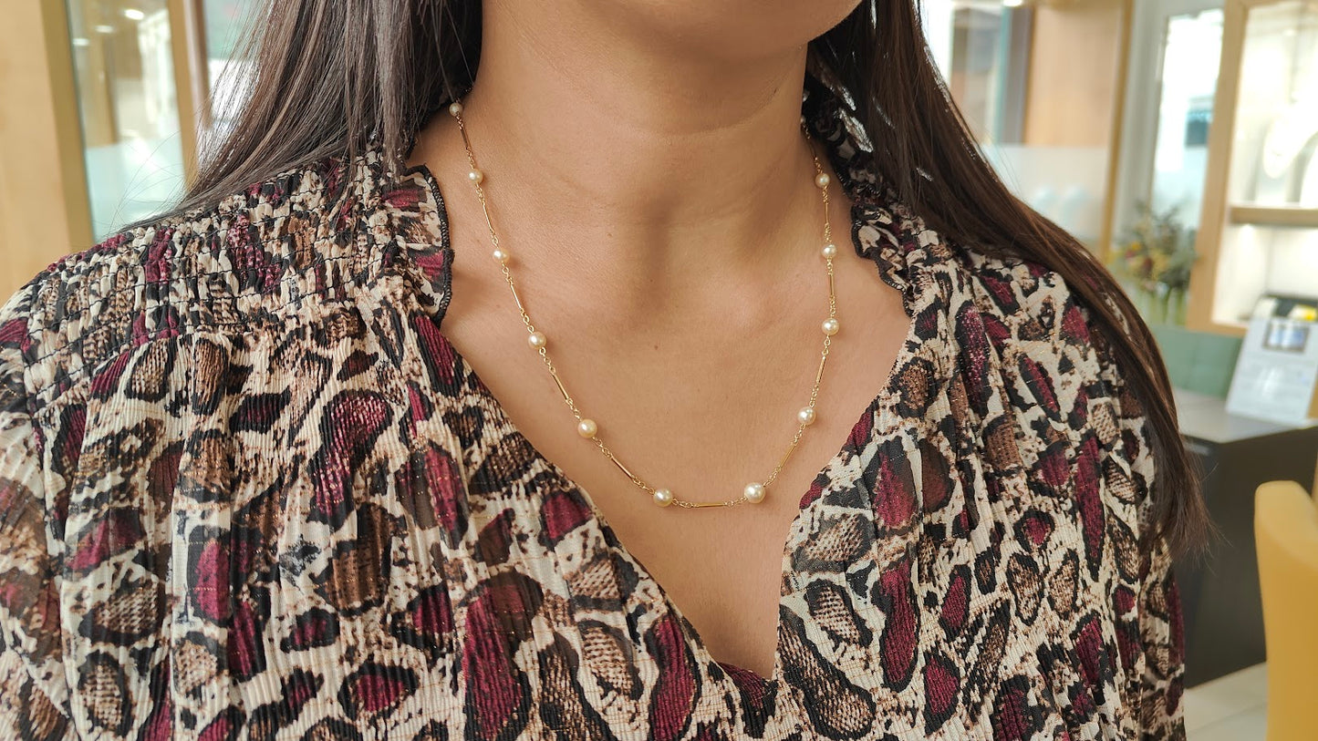 Collier en or jaune à perles – Boules alternées par des barres
