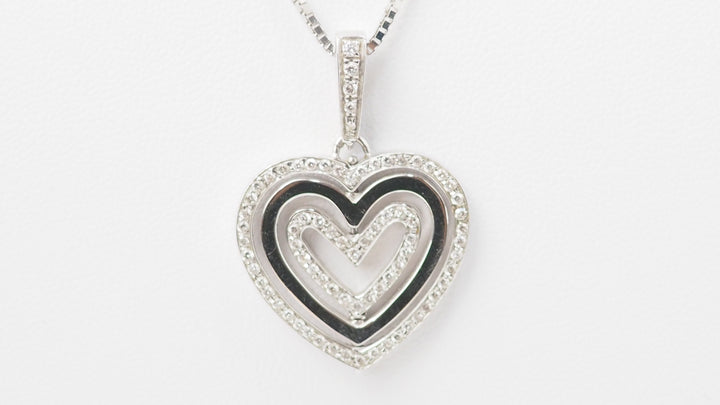 Collier pendentif multi Coeurs en or blanc et diamants