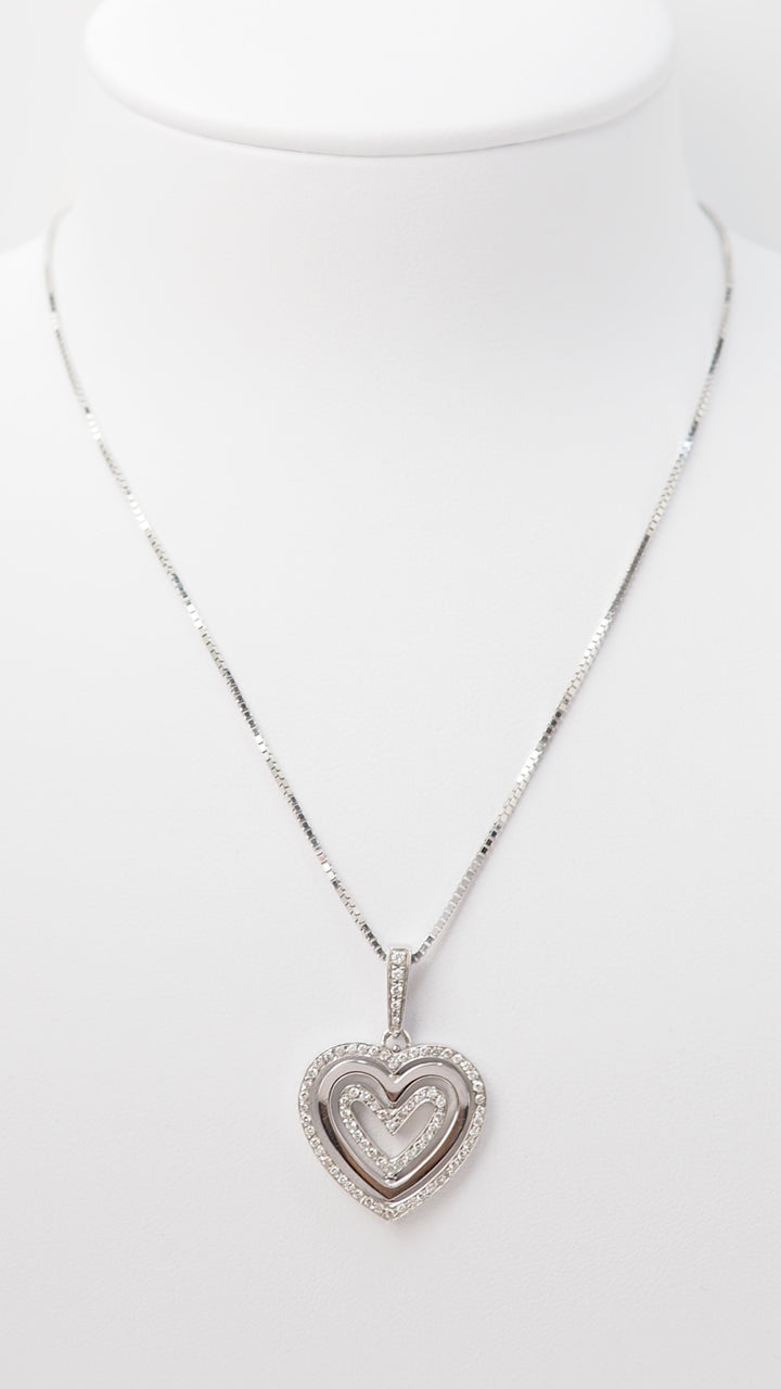Collier pendentif multi Coeurs en or blanc et diamants