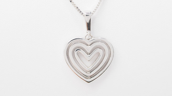 Collier pendentif multi Coeurs en or blanc et diamants