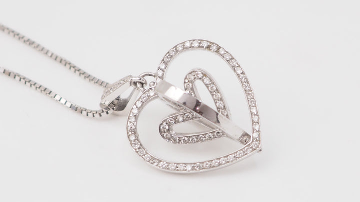 Collier pendentif multi Coeurs en or blanc et diamants