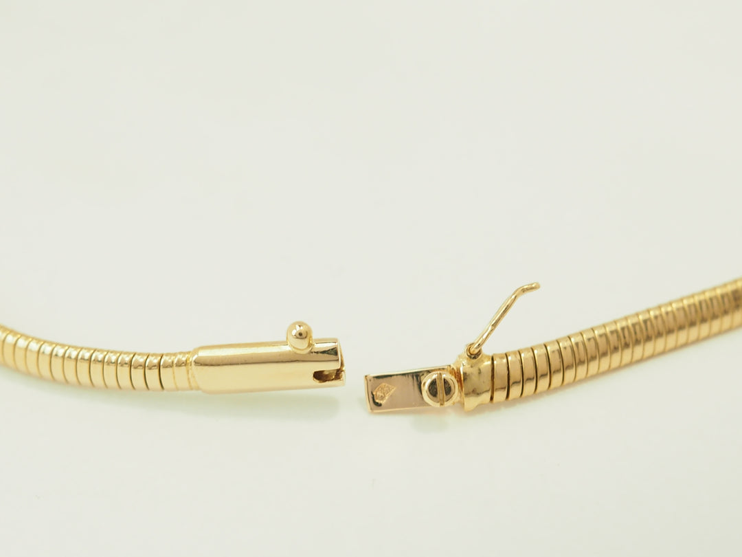 Collier Tubogas ras-de-cou en or jaune 18 carats et diamants
