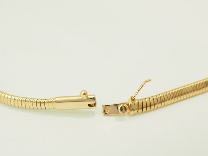 Collier Tubogas ras-de-cou en or jaune 18 carats et diamants