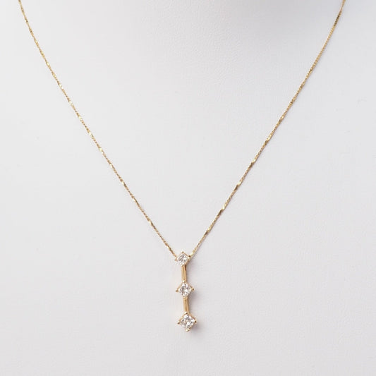Collier trilogie en or jaune et diamants princesse