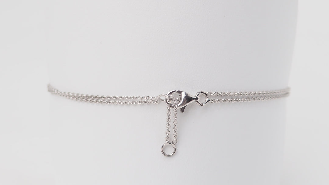 Bracelet coeur en or blanc et diamants