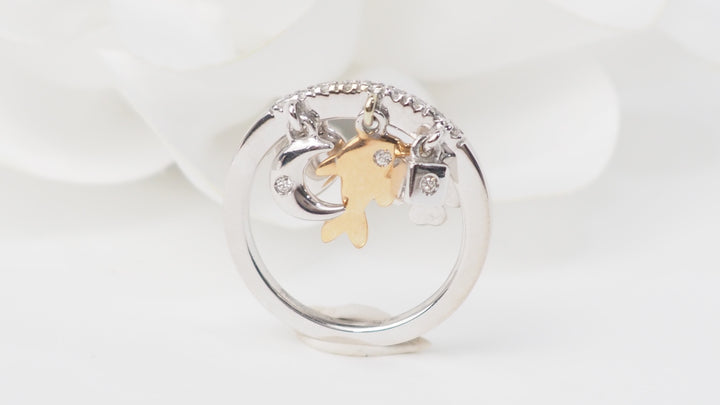 Bague breloques en or blanc et diamants