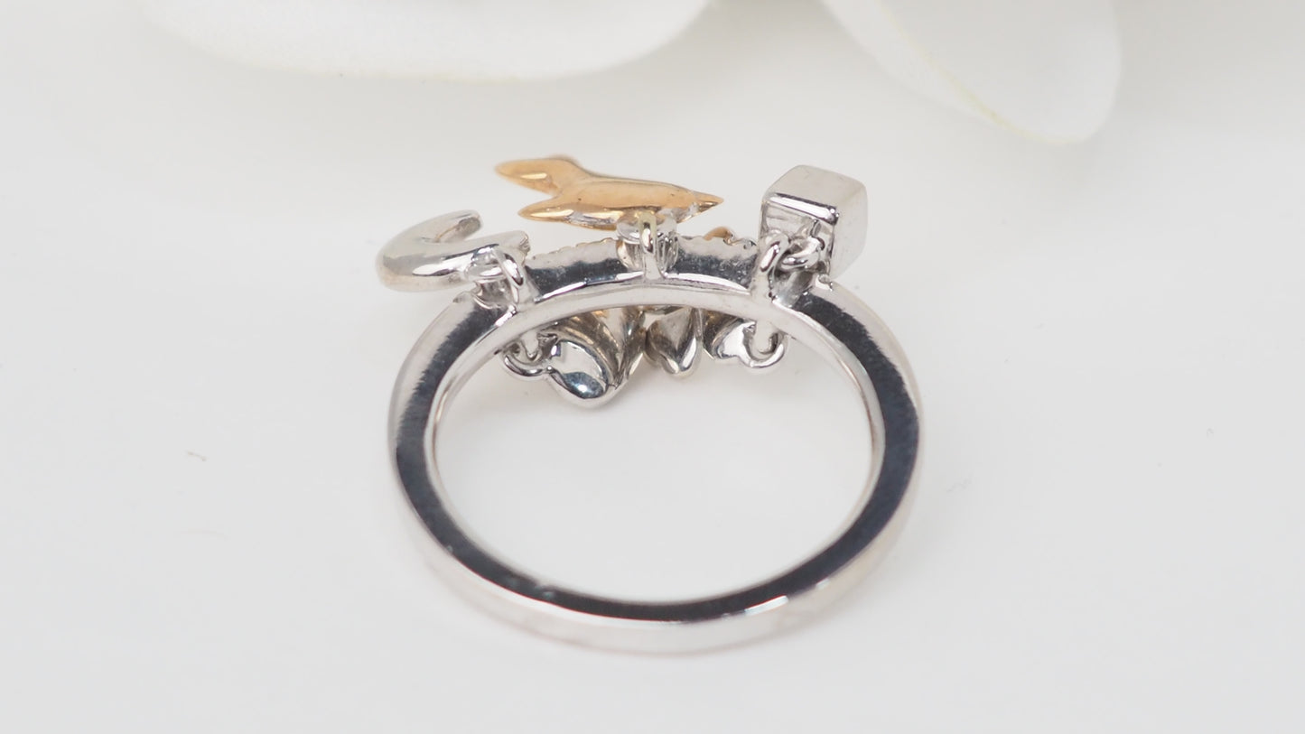 Bague breloques en or blanc et diamants