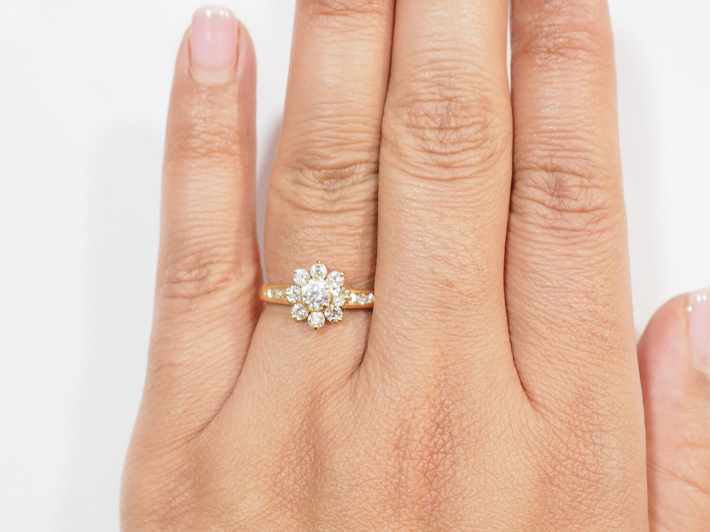 Bague marguerite en or jaune et diamants