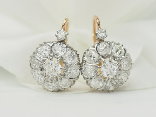 Boucles d'oreilles dormeuses en or jaune et diamants