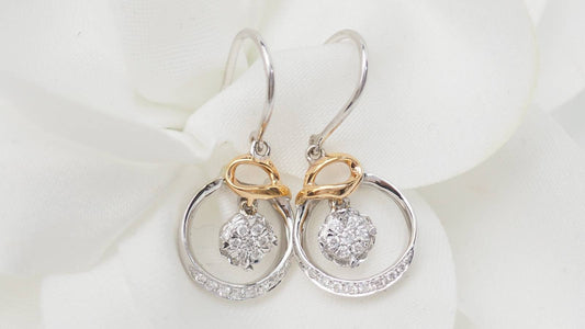 Boucles d'oreilles en or rose blanc et diamants