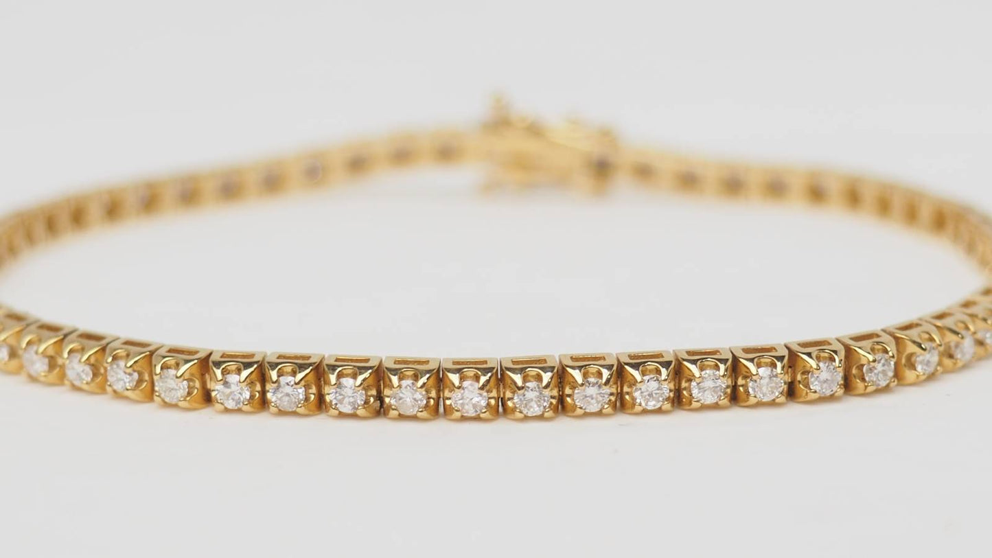 Bracelet rivière en or jaune et diamants 1,50ct