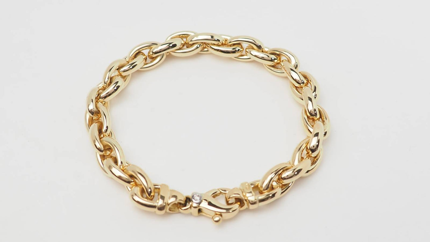 Bracelet souple maille forçat ovale en or jaune et diamant