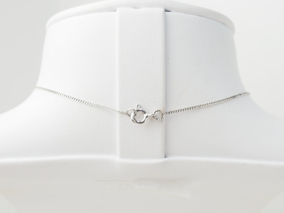 collier croix en or blanc et diamants