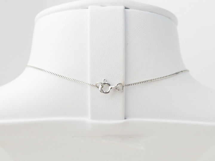 collier croix en or blanc et diamants