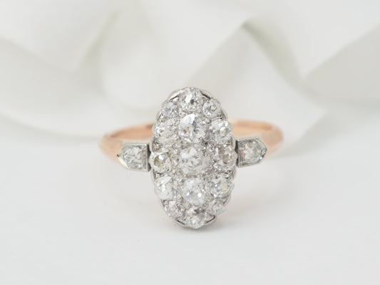 Bague ancienne pavée de diamants en or rose et platine
