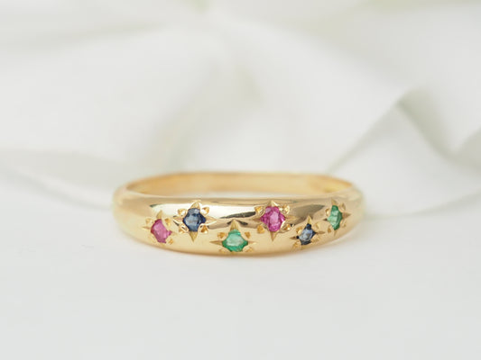 Bague jonc en or rose et pierres précieuses