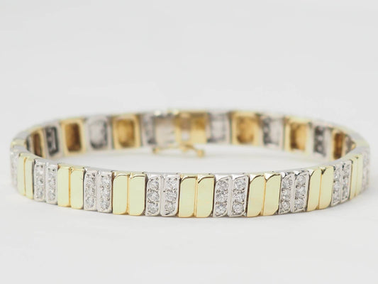 Bracelet vintage en or bicolore et diamants