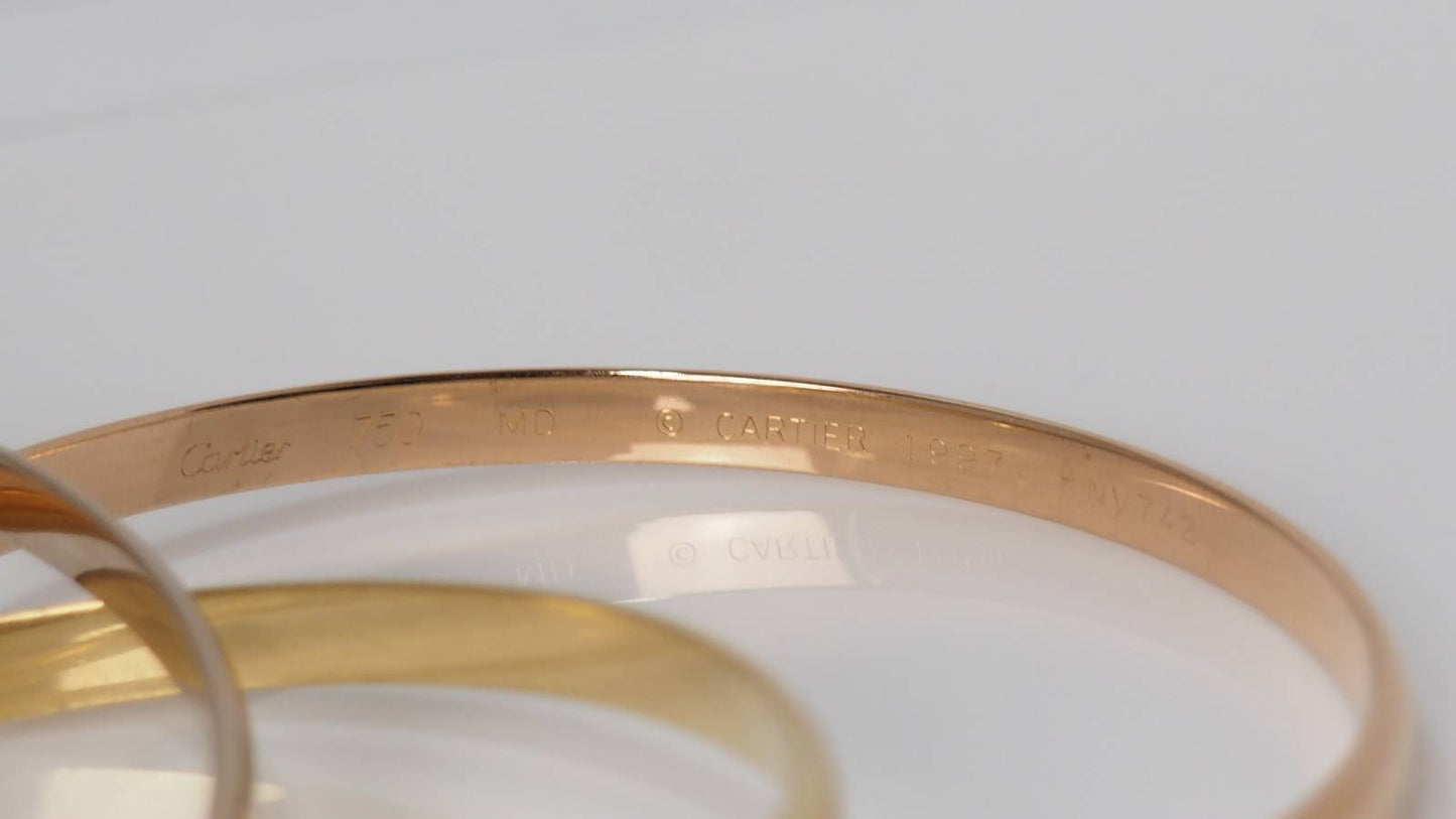 Bracelet Trinity de Cartier d'occasion trois ors