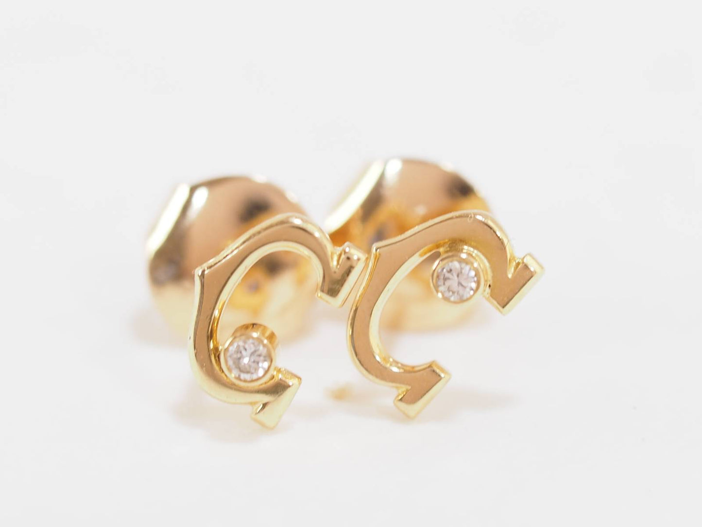 Boucles d'oreilles Cartier C en or jaune et diamants