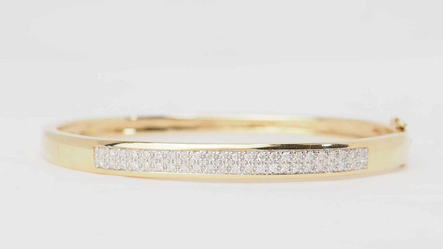 Bracelet ouvrant en or jaune et diamants