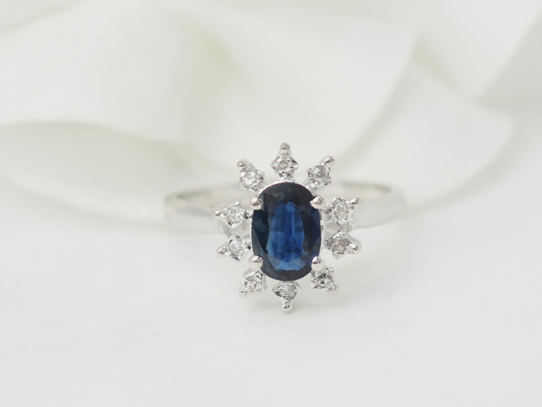 Bague marguerite en or blanc et saphir