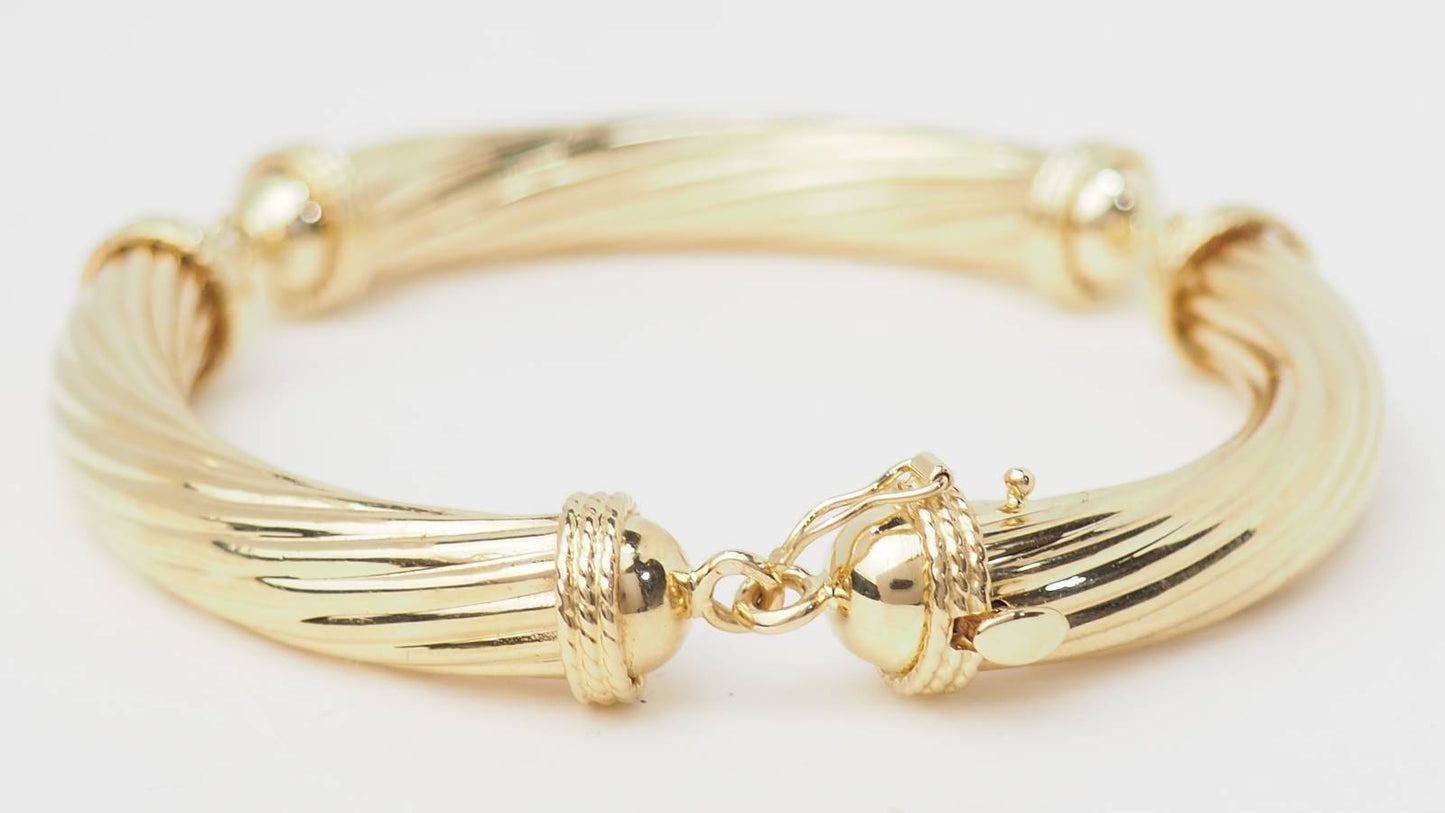 Bracelet articulé en or jaune 18kt