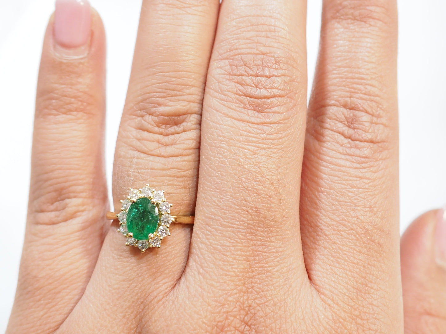 Bague marguerite en or jaune, émeraude et diamants