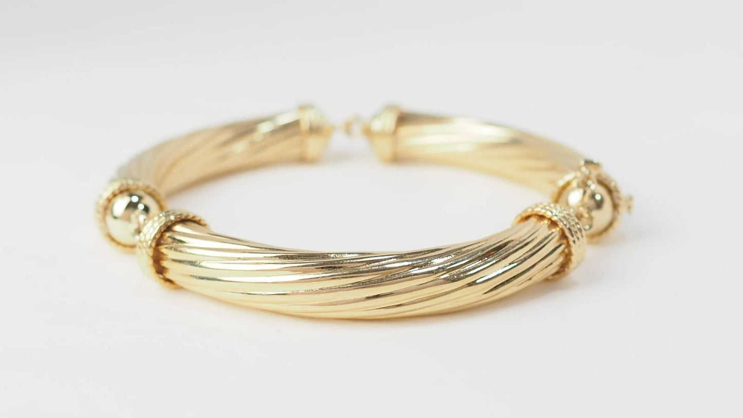 Bracelet articulé en or jaune 18kt