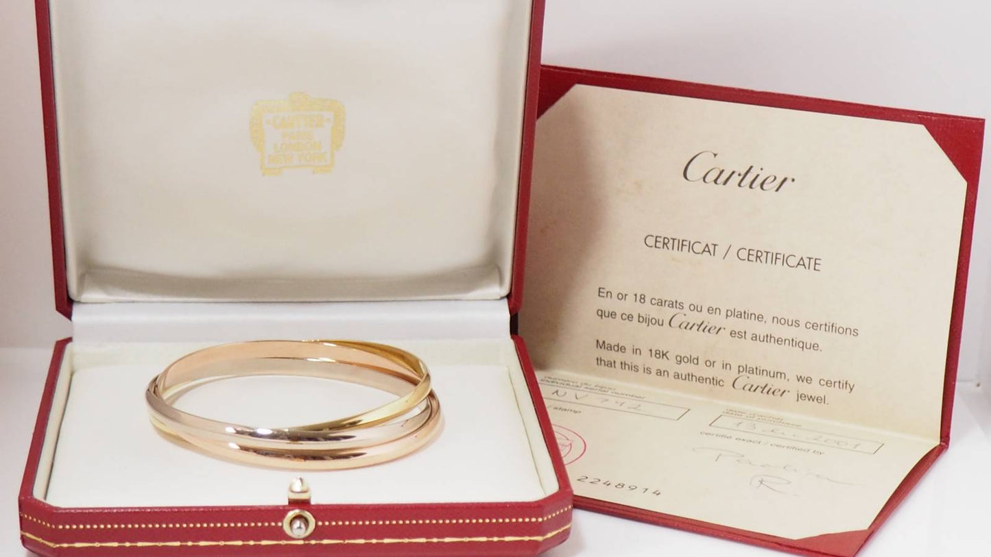 Bracelet Trinity de Cartier d'occasion trois ors