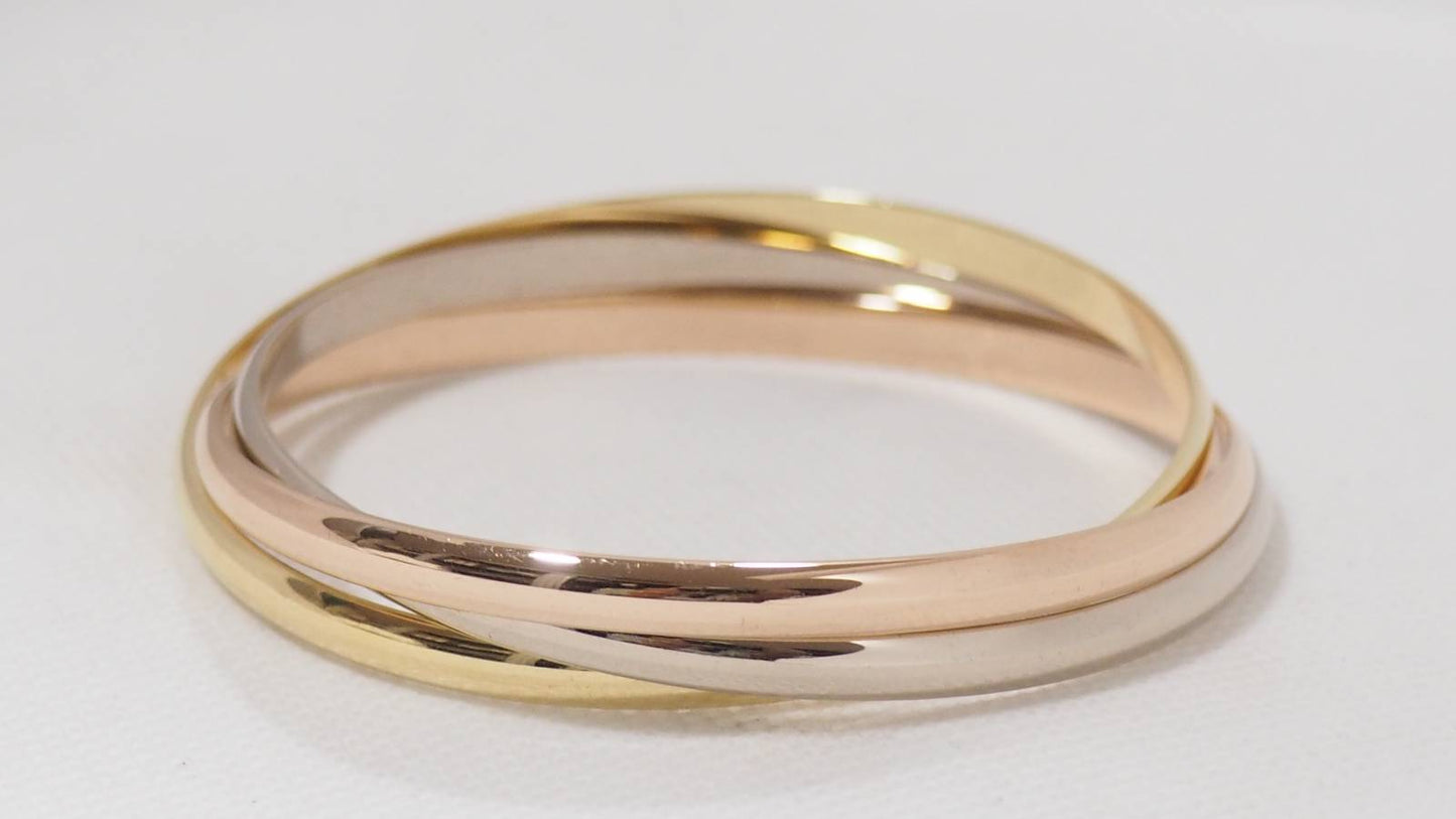 Bracelet Trinity de Cartier d'occasion trois ors