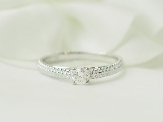 Bague solitaire Mauboussin "Fan du premier jour" en or blanc et diamant