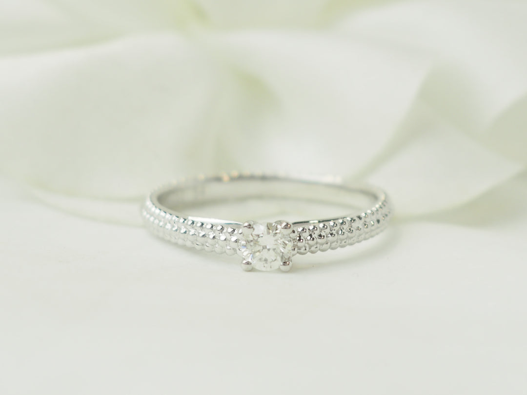 Bague solitaire Mauboussin "Fan du premier jour" en or blanc et diamant