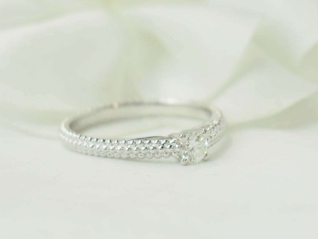 Bague solitaire Mauboussin "Fan du premier jour" en or blanc et diamant