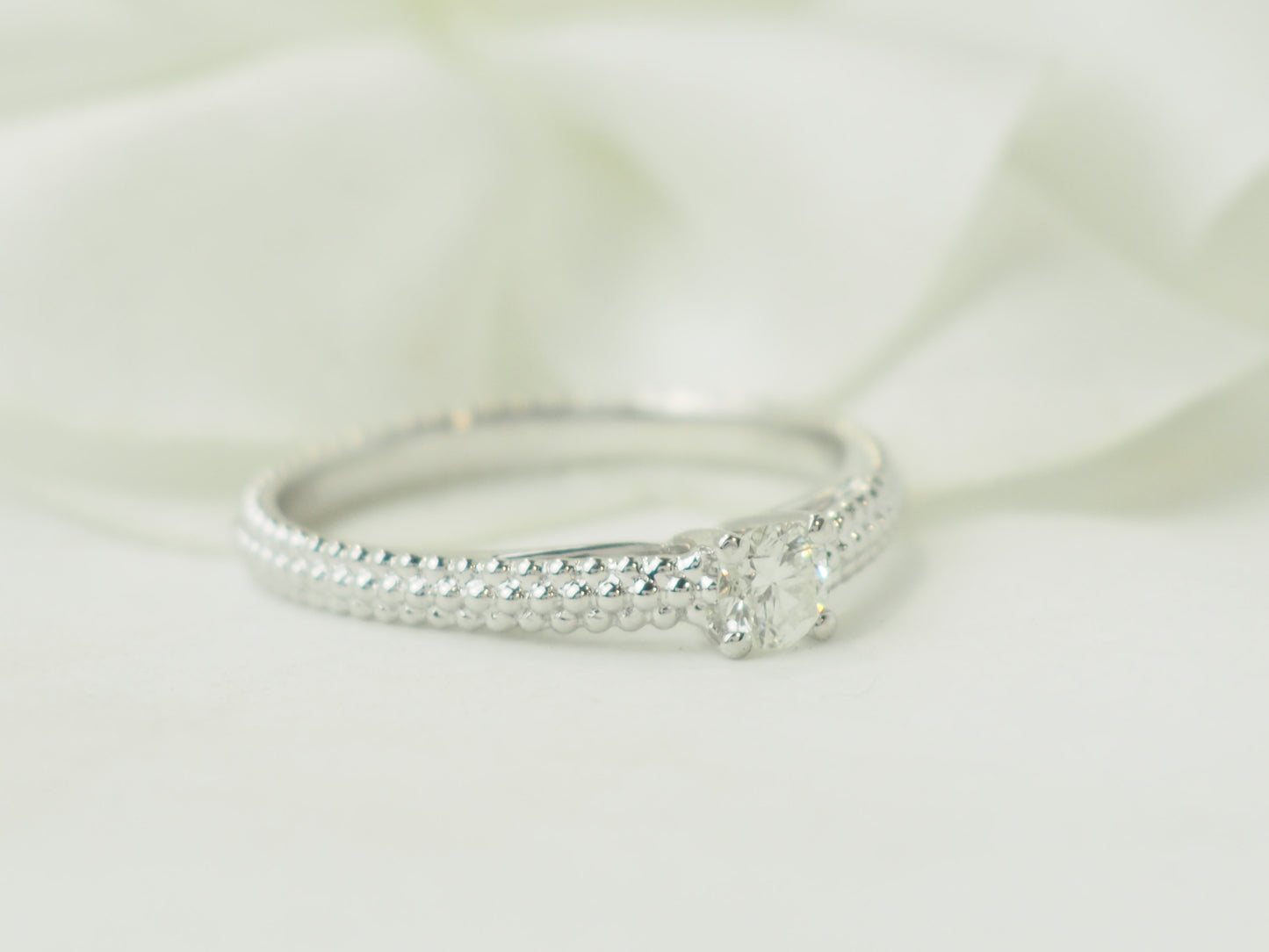 Bague solitaire Mauboussin "Fan du premier jour" en or blanc et diamant