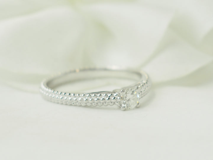 Bague solitaire Mauboussin "Fan du premier jour" en or blanc et diamant