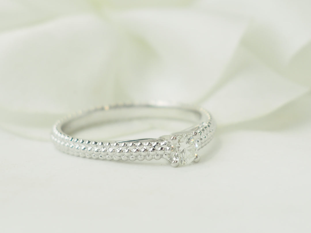 Bague solitaire Mauboussin "Fan du premier jour" en or blanc et diamant