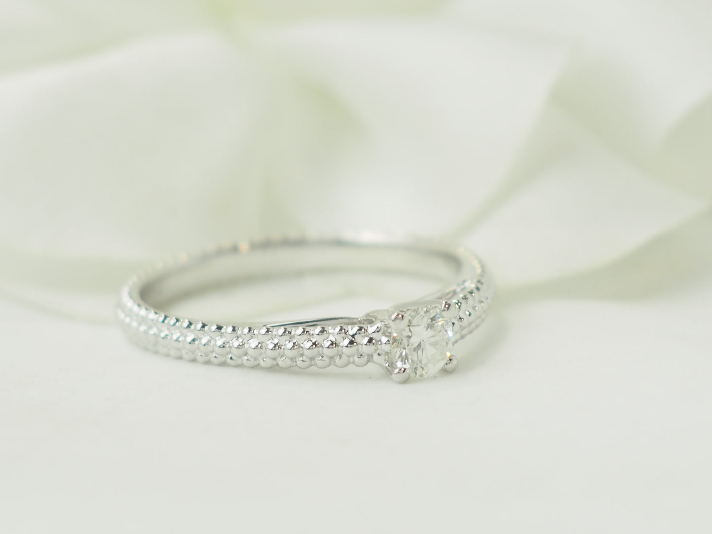 Bague solitaire Mauboussin "Fan du premier jour" en or blanc et diamant