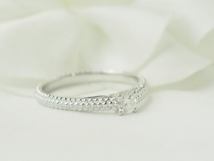 Bague solitaire Mauboussin "Fan du premier jour" en or blanc et diamant