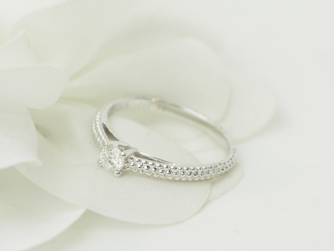 Bague solitaire Mauboussin "Fan du premier jour" en or blanc et diamant
