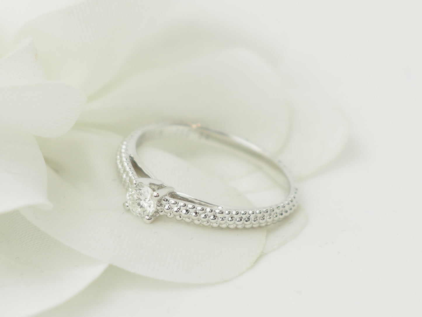 Bague solitaire Mauboussin "Fan du premier jour" en or blanc et diamant