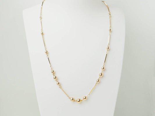 Collier boules en or rose