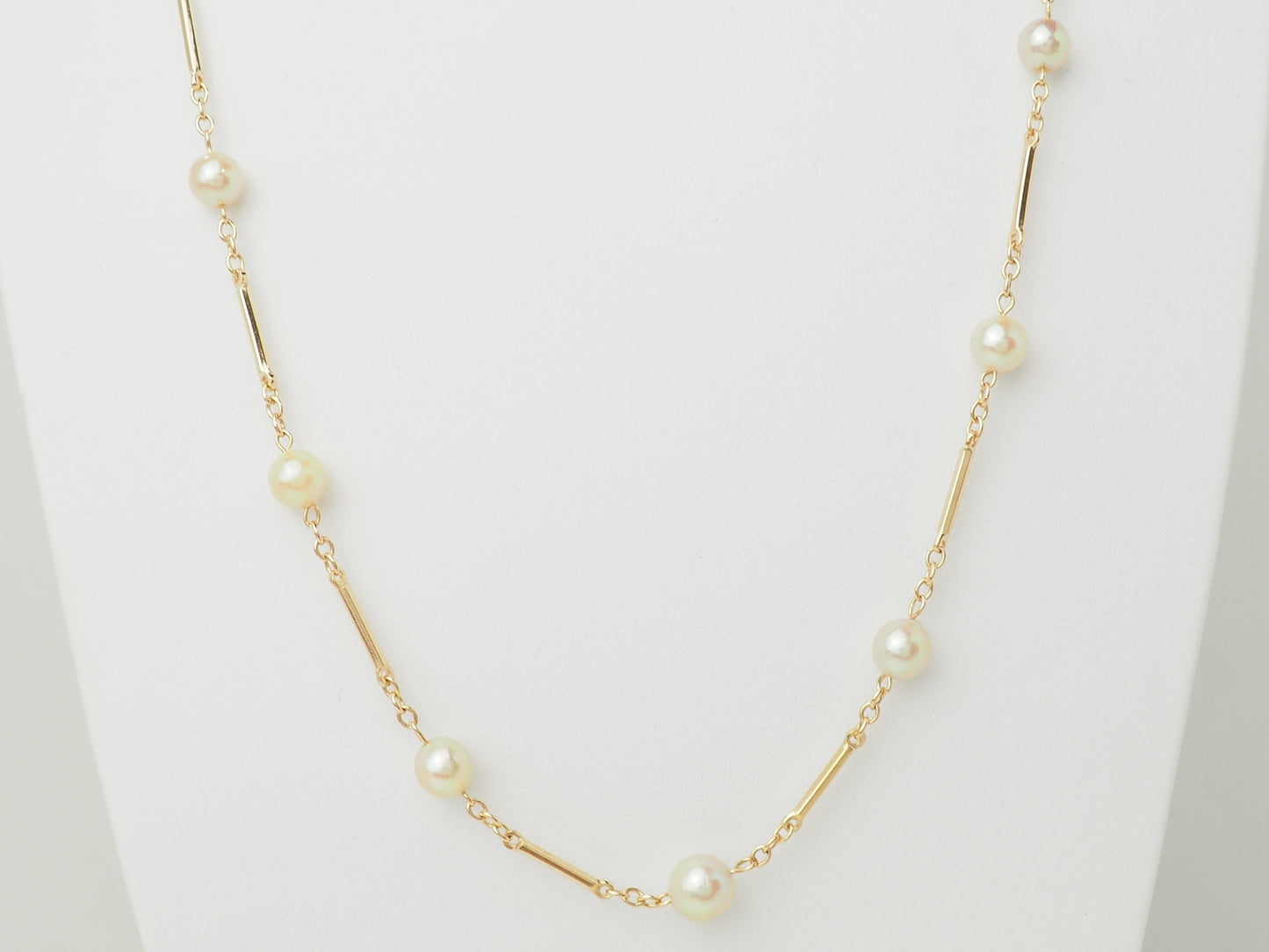 Collier en or jaune à perles – Boules alternées par des barres